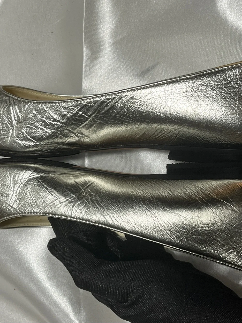 CHANEL Silver Metallic Leather Ballet Flats with Black Cap Toe